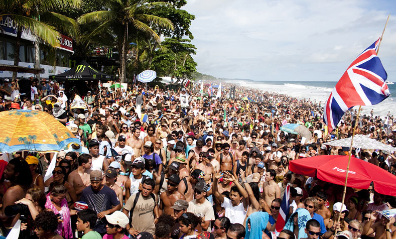 Photo of Multitudes gathered in 2009 ISA World Surfing Games in Playa Hermosa depicts the extreme popularity this surfing event. Image Source: isaworlds.com